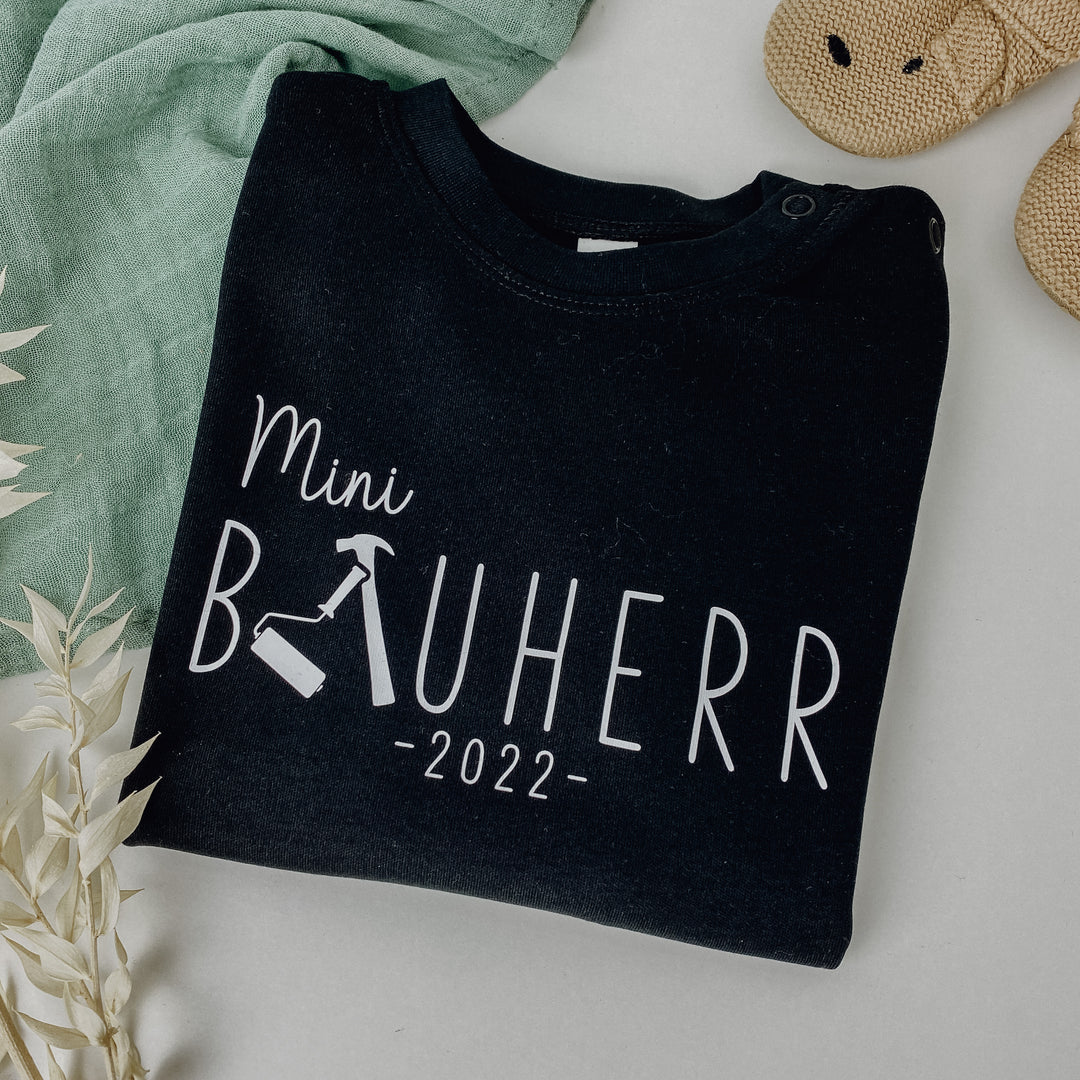 Baby-Shirt Mini BAUHERR/IN + JAHRESZAHL (personalisiert)